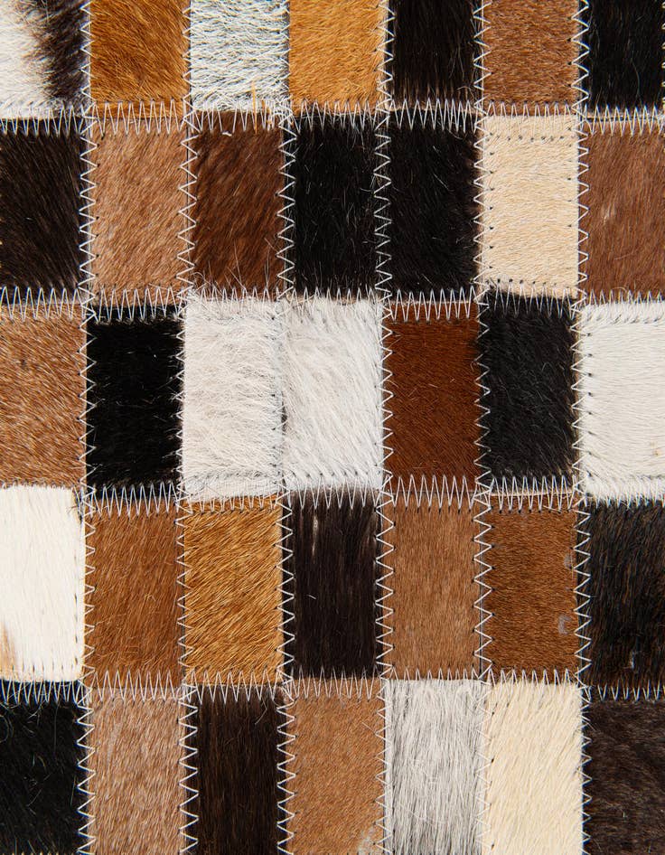 Detail image of  5' 5 x 7' 7 Cowhide Stocks Rug