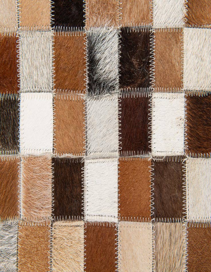 Detail image of  5' 1 x 7' 11 Cowhide Stocks Rug