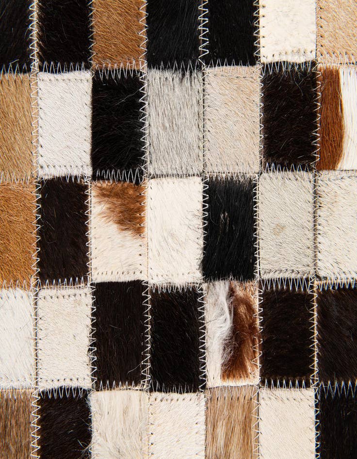 Detail image of  5' 3 x 7' 6 Cowhide Stocks Rug