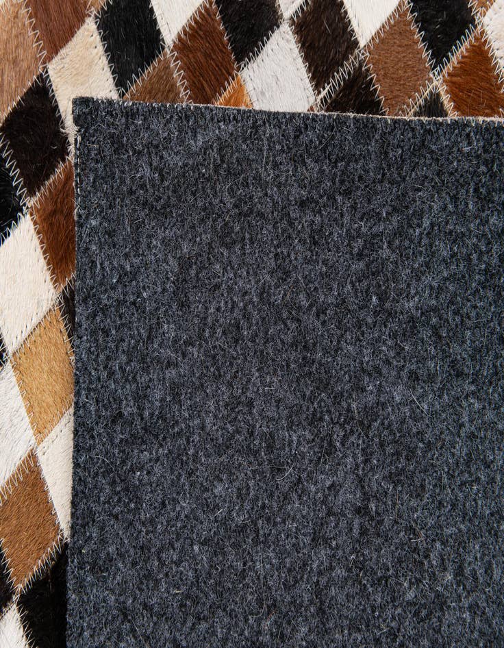 Detail image of  5' 6 x 7' 9 Cowhide Stocks Rug