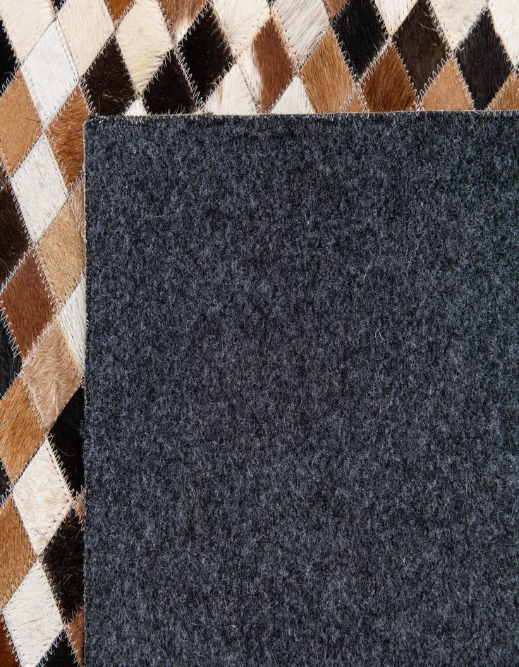 Detail image of  5' 4 x 7' 9 Cowhide Stocks Rug