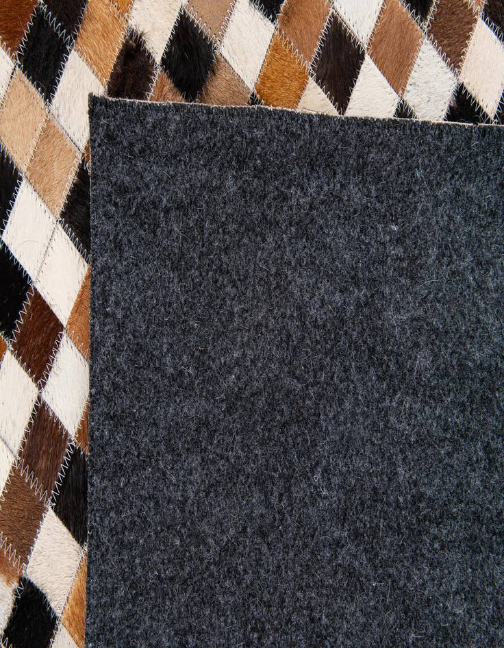 Detail image of  5' 6 x 7' 7 Cowhide Stocks Rug