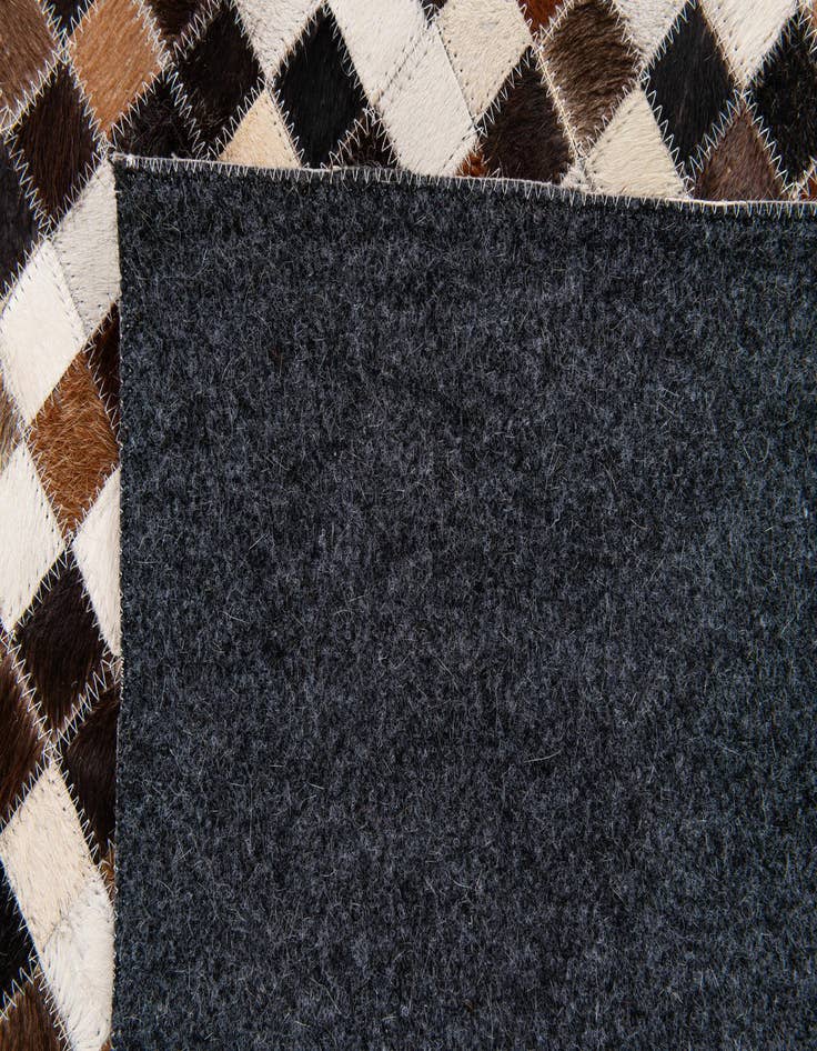 Detail image of  5' 6 x 7' 6 Cowhide Stocks Rug