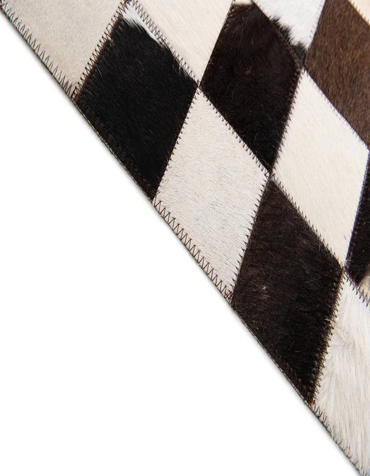Detail image of  5' x 8' Cowhide Stocks Rug