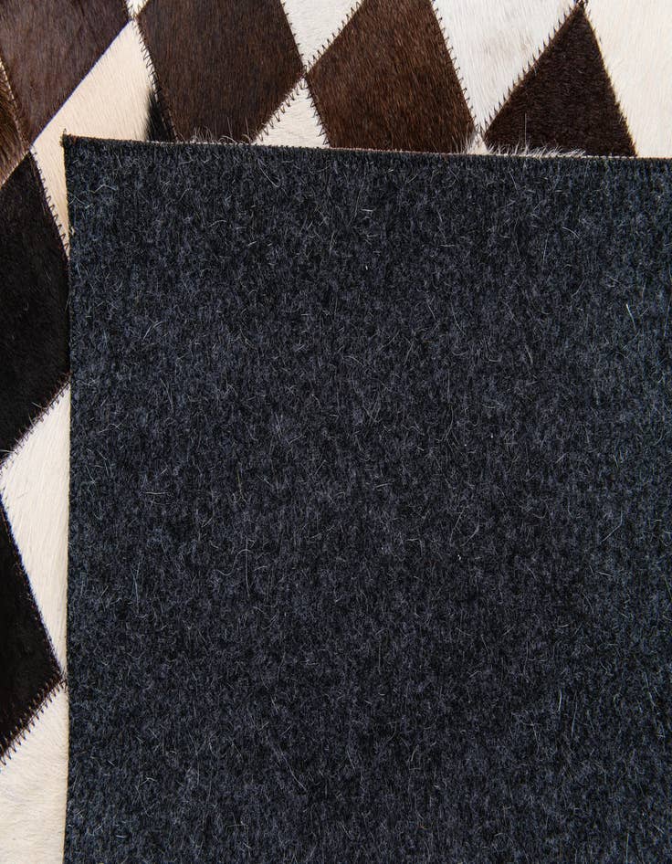 Detail image of  5' x 8' Cowhide Stocks Rug