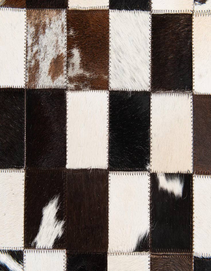 Detail image of  5' x 7' 11 Cowhide Stocks Rug