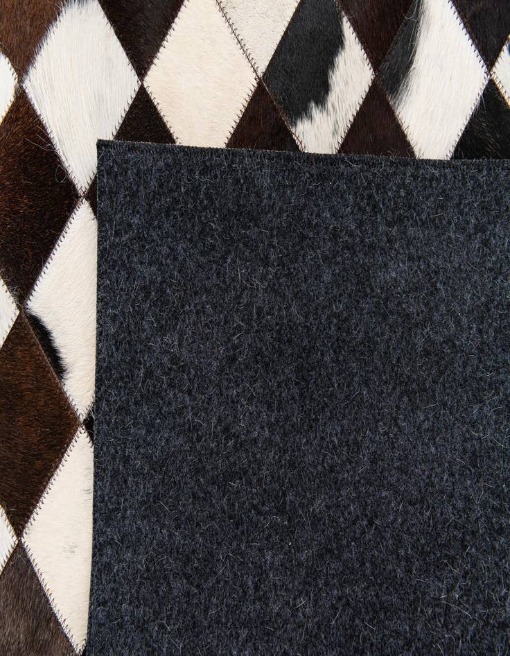 Detail image of  5' x 8' Cowhide Stocks Rug