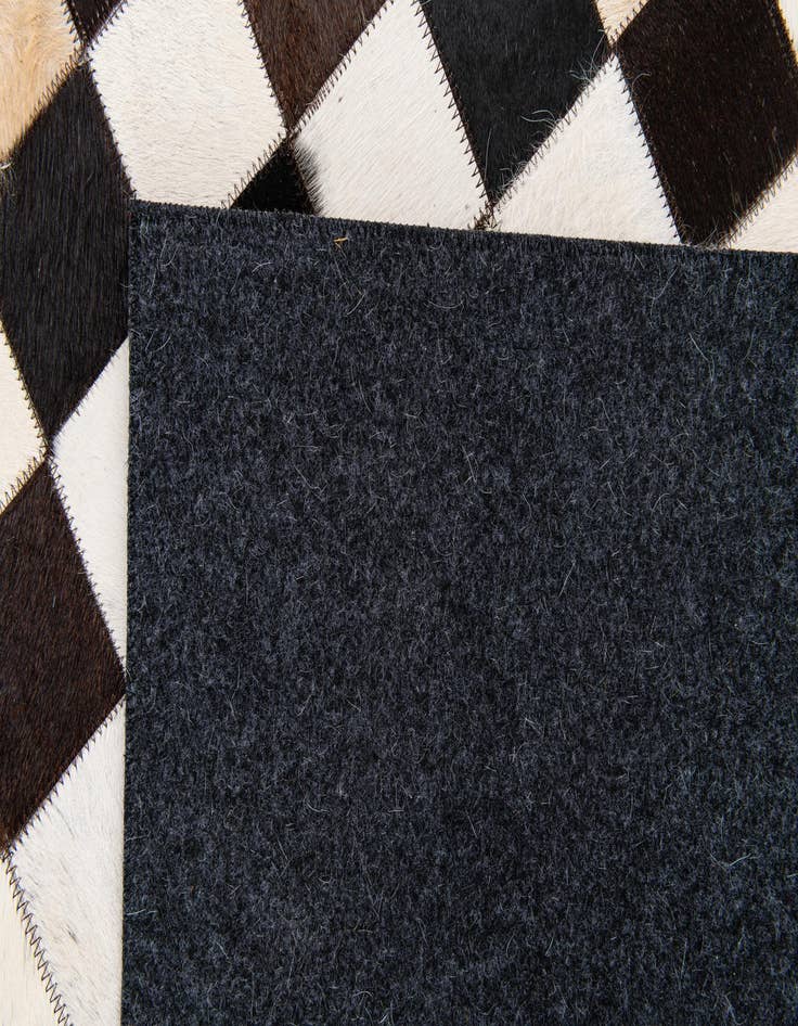 Detail image of  5' x 8' Cowhide Stocks Rug