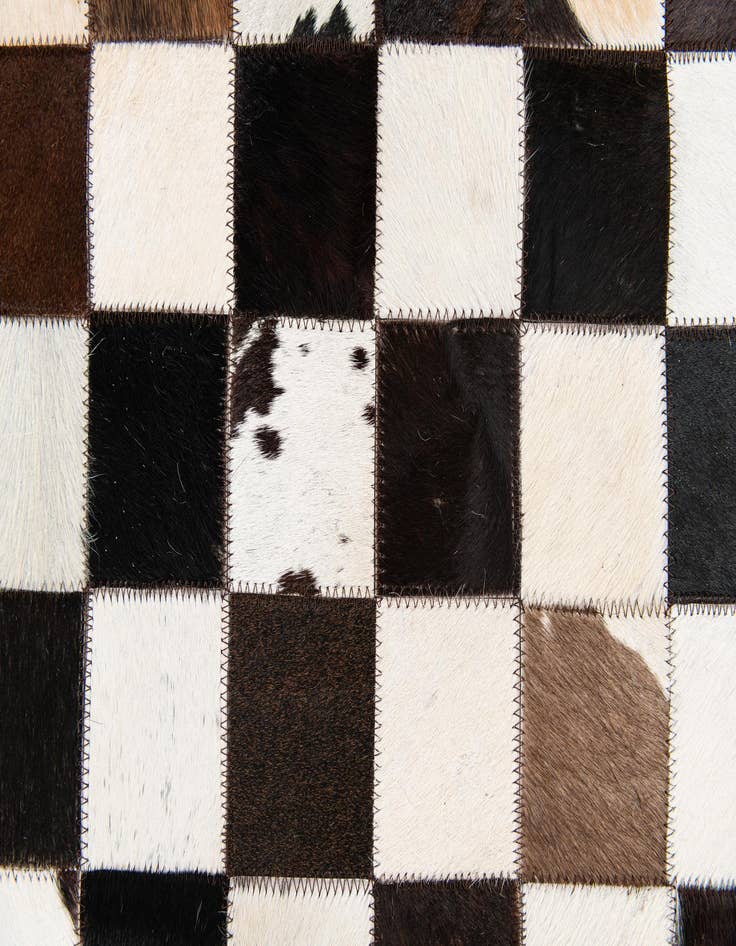 Detail image of  5' 1 x 8' Cowhide Stocks Rug