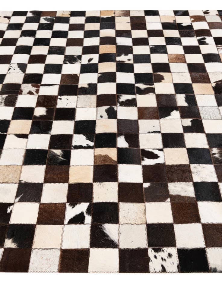 Detail image of  5' 1 x 8' Cowhide Stocks Rug