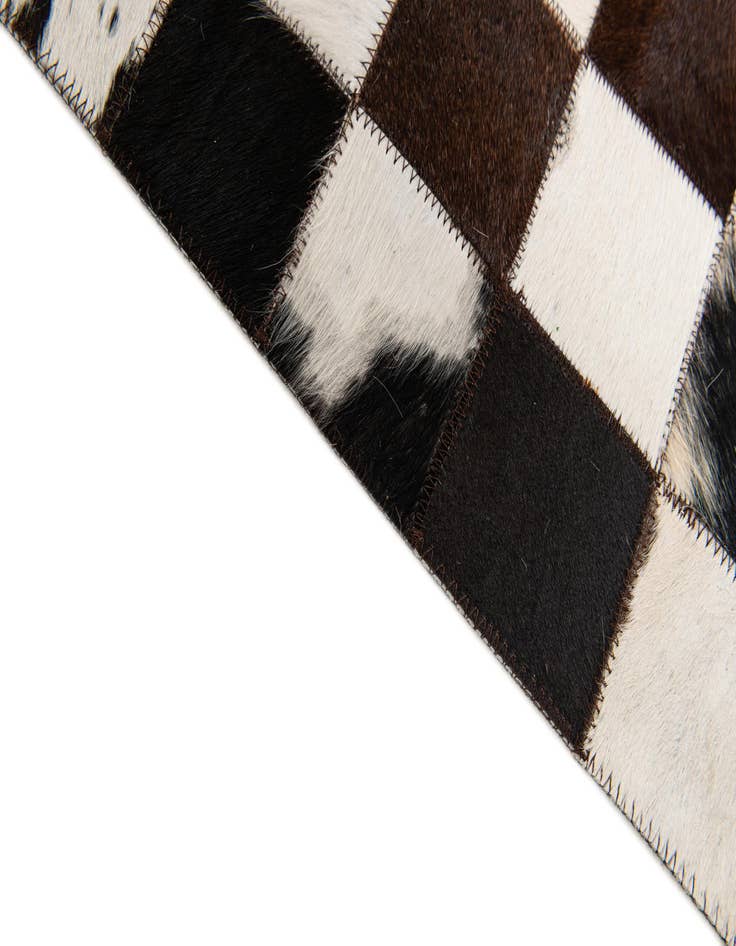 Detail image of  5' 1 x 8' Cowhide Stocks Rug