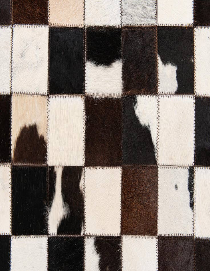 Detail image of  5' 1 x 8' Cowhide Stocks Rug