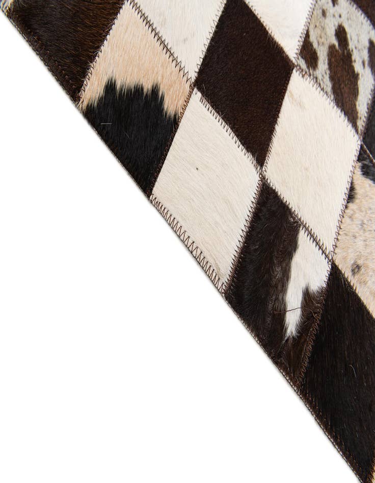Detail image of  5' x 7' 11 Cowhide Stocks Rug
