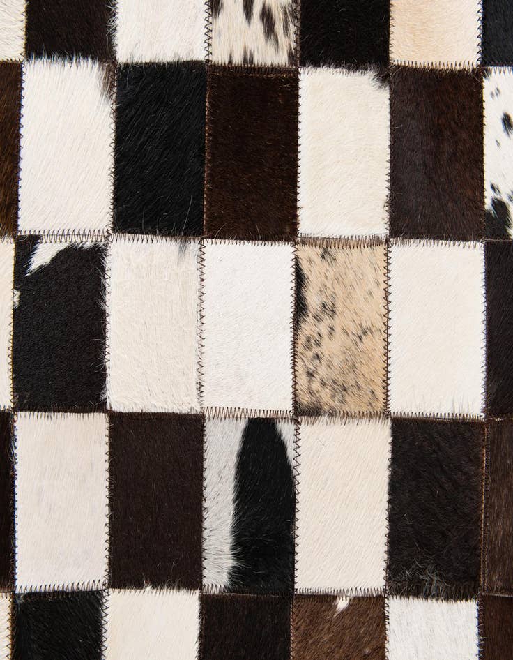 Detail image of  5' x 7' 11 Cowhide Stocks Rug