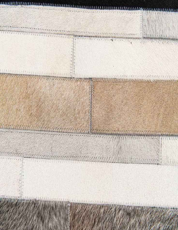 Detail image of  5' 1 x 8' Cowhide Stocks Rug