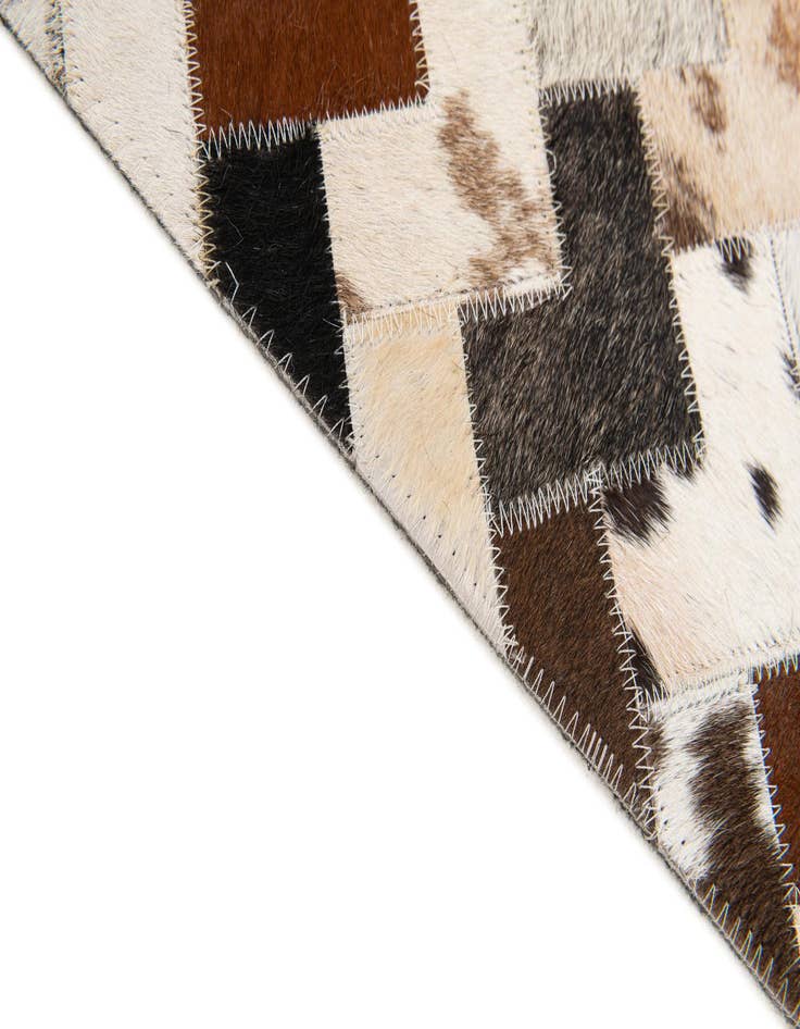 Detail image of  5' 1 x 7' 11 Cowhide Stocks Rug