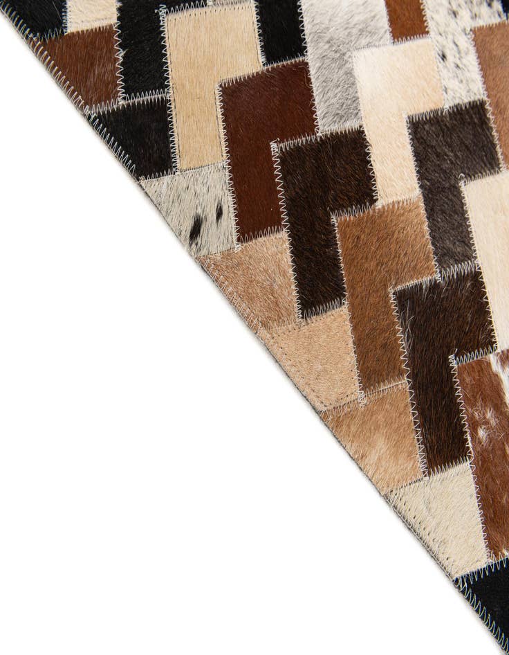 Detail image of  5' 1 x 8' Cowhide Stocks Rug