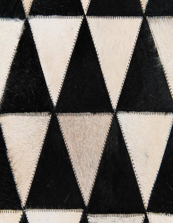 Detail image of  5' 2 x 8' Cowhide Stocks Rug