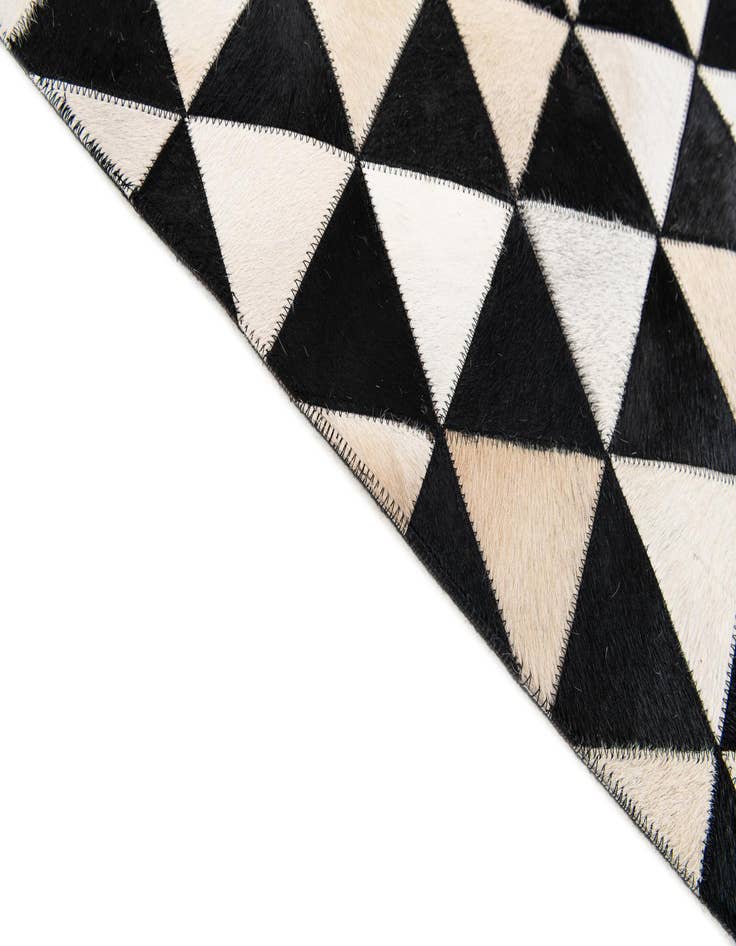 Detail image of  5' 1 x 8' 1 Cowhide Stocks Rug