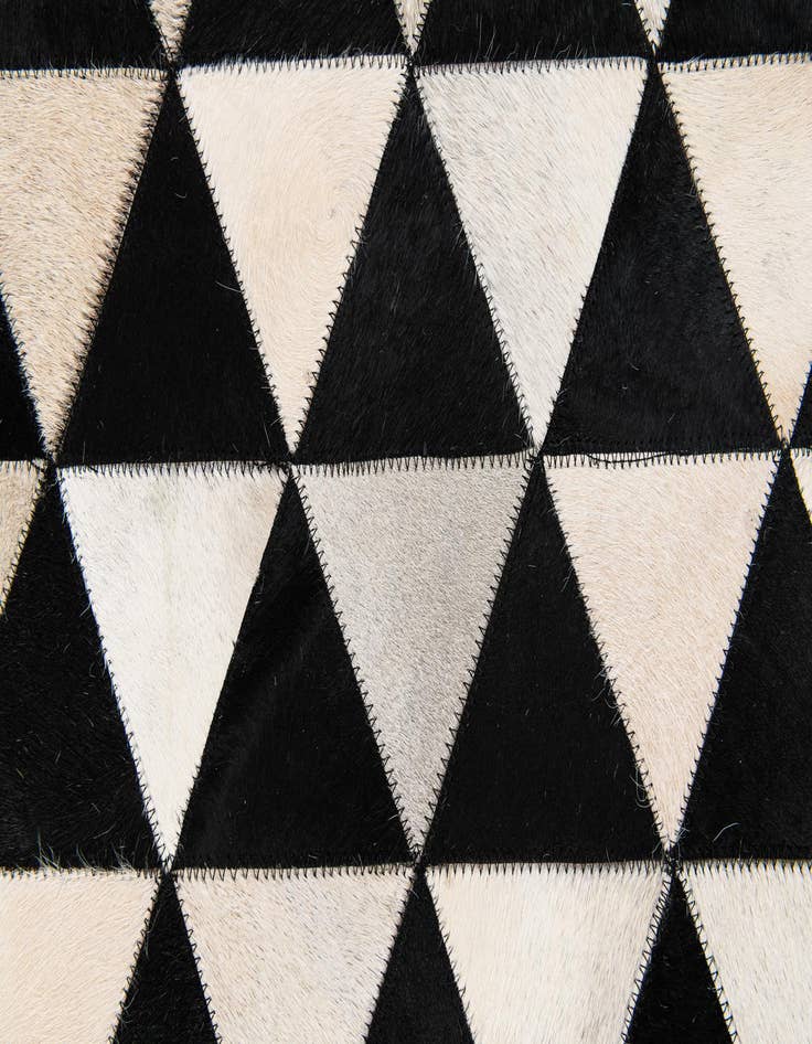 Detail image of  5' 1 x 8' 1 Cowhide Stocks Rug