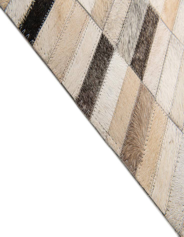 Detail image of  5' 1 x 7' 10 Cowhide Stocks Rug