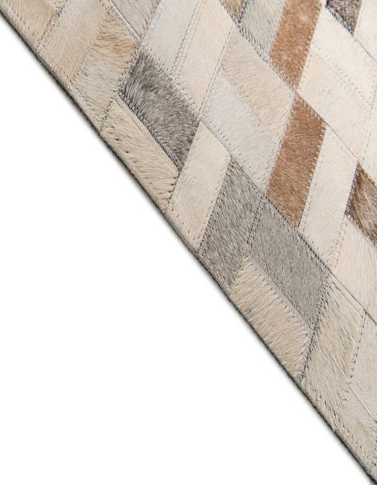 Detail image of  5' 3 x 7' 6 Cowhide Stocks Rug