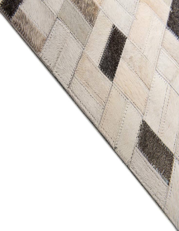 Detail image of  5' 3 x 7' 5 Cowhide Stocks Rug