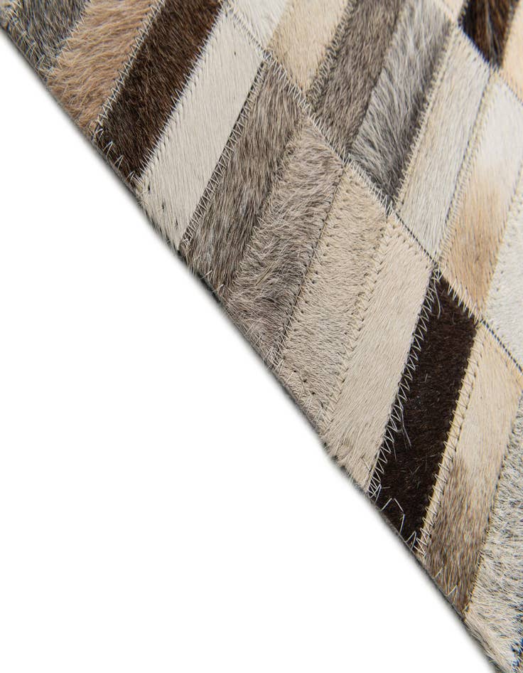 Detail image of  5' 1 x 7' 10 Cowhide Stocks Rug