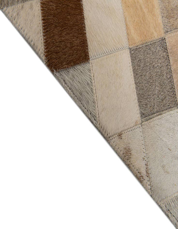 Detail image of  5' 2 x 8' 1 Cowhide Stocks Rug