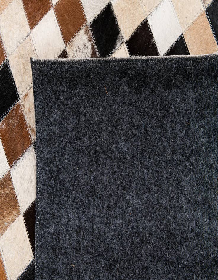 Detail image of  5' x 8' Cowhide Stocks Rug