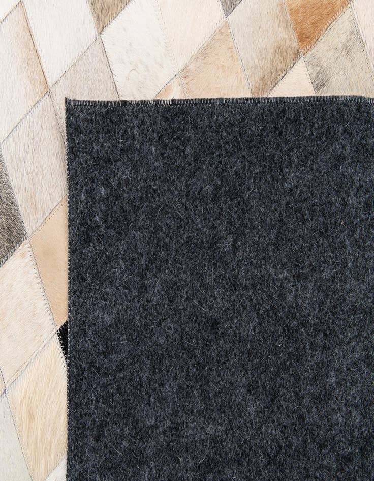 Detail image of  5' 1 x 7' 10 Cowhide Stocks Rug