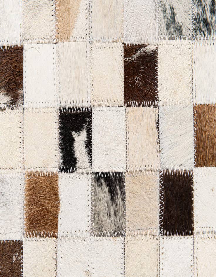 Detail image of  5' x 7' 11 Cowhide Stocks Rug