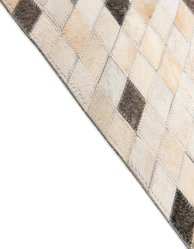 Detail image of  5' x 7' 11 Cowhide Stocks Rug