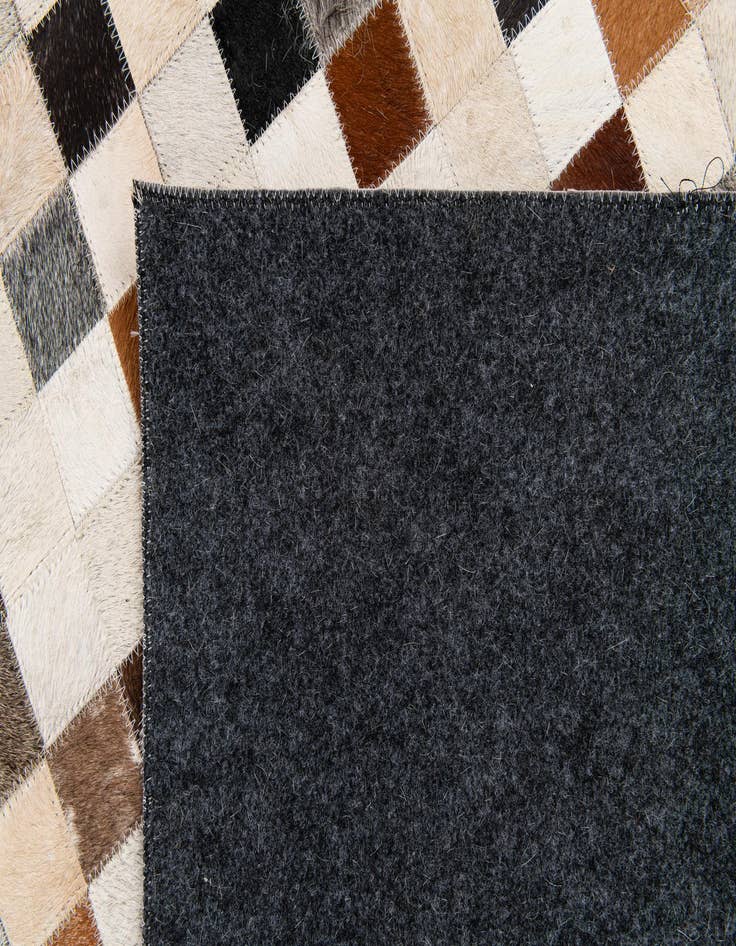 Detail image of  5' x 8' Cowhide Stocks Rug