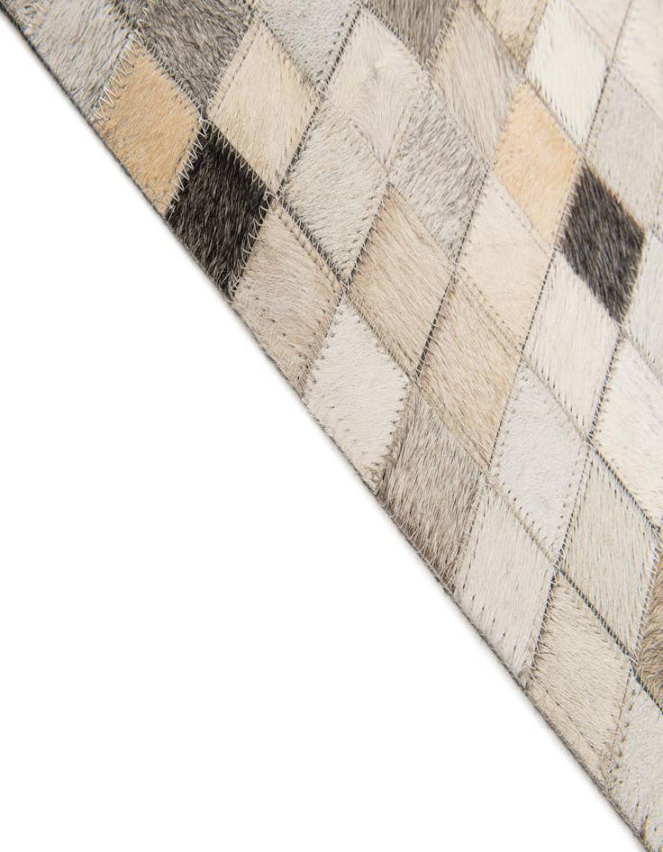Detail image of  5' x 7' 11 Cowhide Stocks Rug