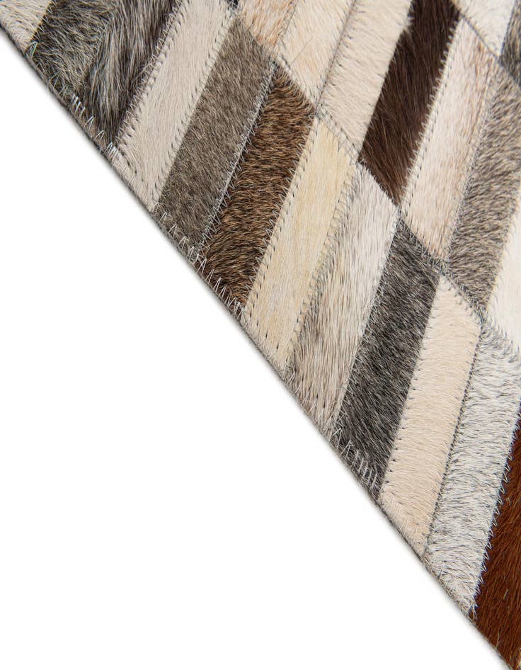 Detail image of  5' 1 x 7' 11 Cowhide Stocks Rug