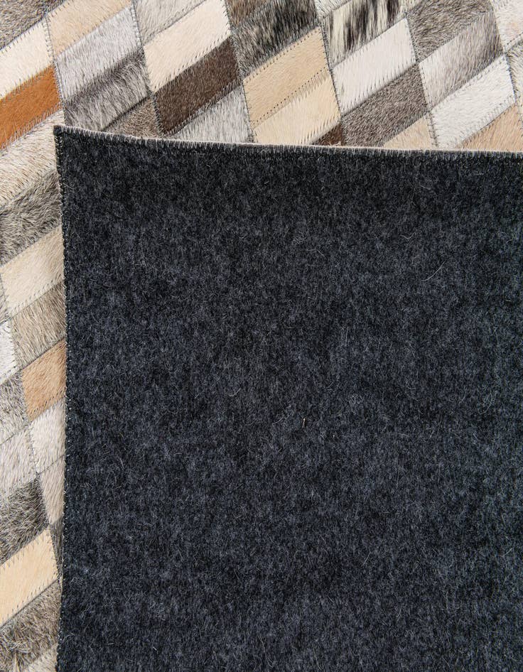 Detail image of  5' 1 x 7' 11 Cowhide Stocks Rug