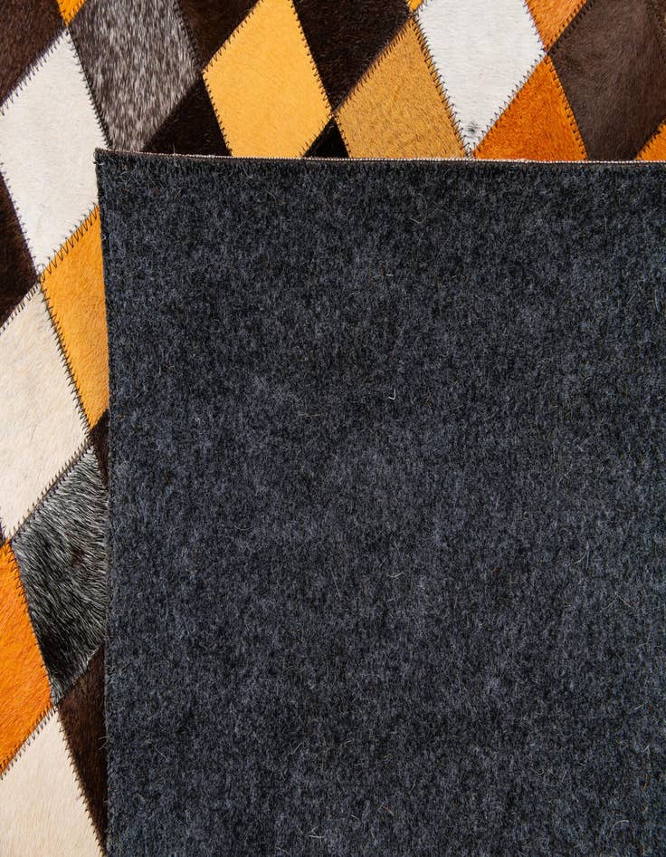 Detail image of  5' 2 x 8' Cowhide Stocks Rug