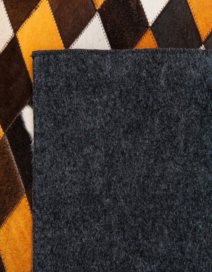 Detail image of  5' 1 x 8' Cowhide Stocks Rug