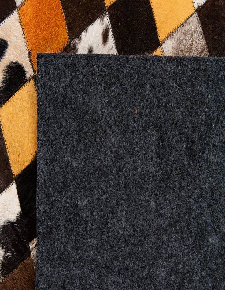Detail image of  5' 2 x 8' 1 Cowhide Stocks Rug