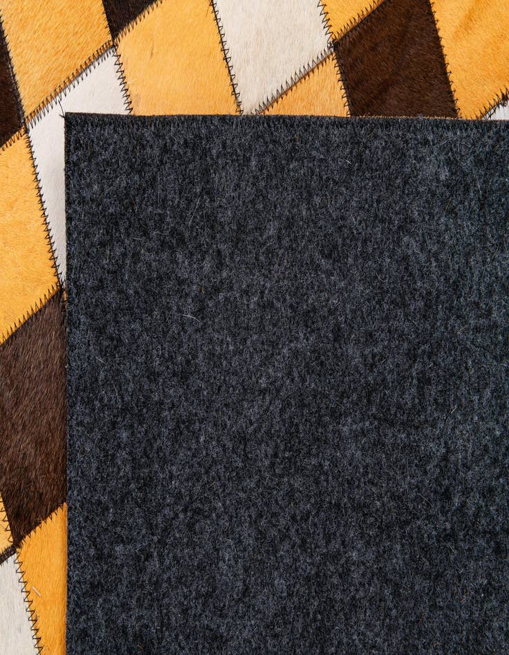 Detail image of  5' 2 x 8' Cowhide Stocks Rug