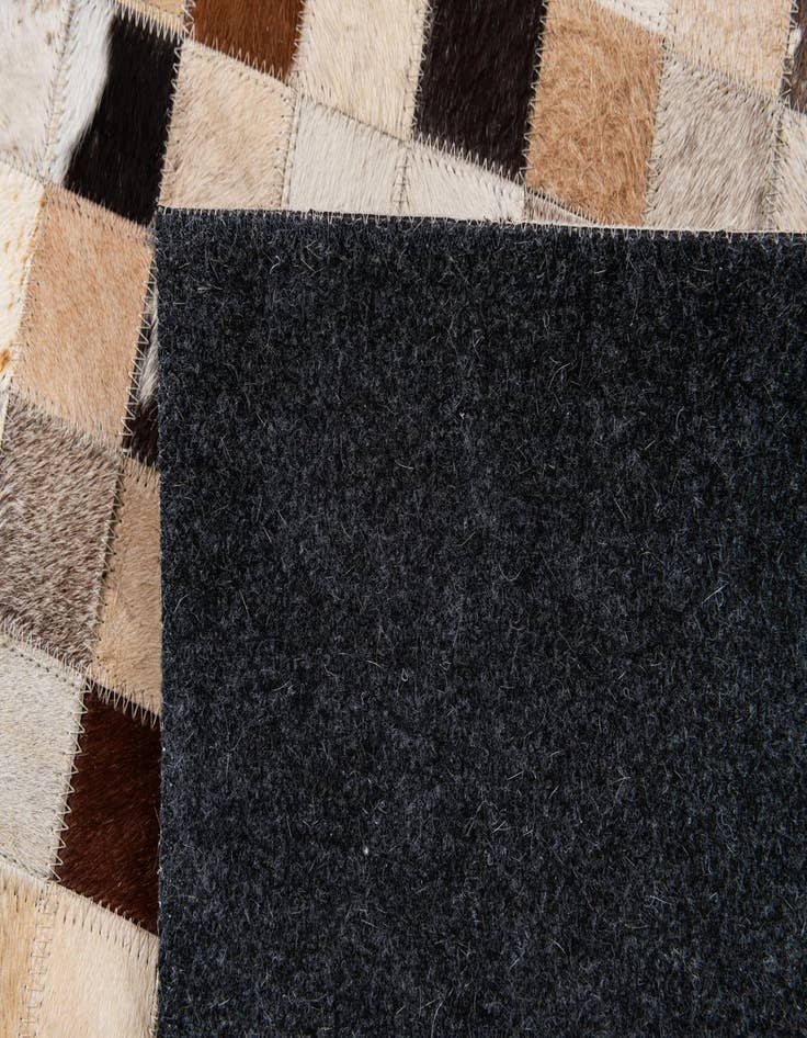 Detail image of  5' 1 x 7' 11 Cowhide Stocks Rug