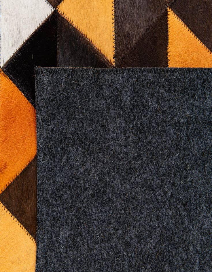 Detail image of  4' 10 x 8' 1 Cowhide Stocks Rug