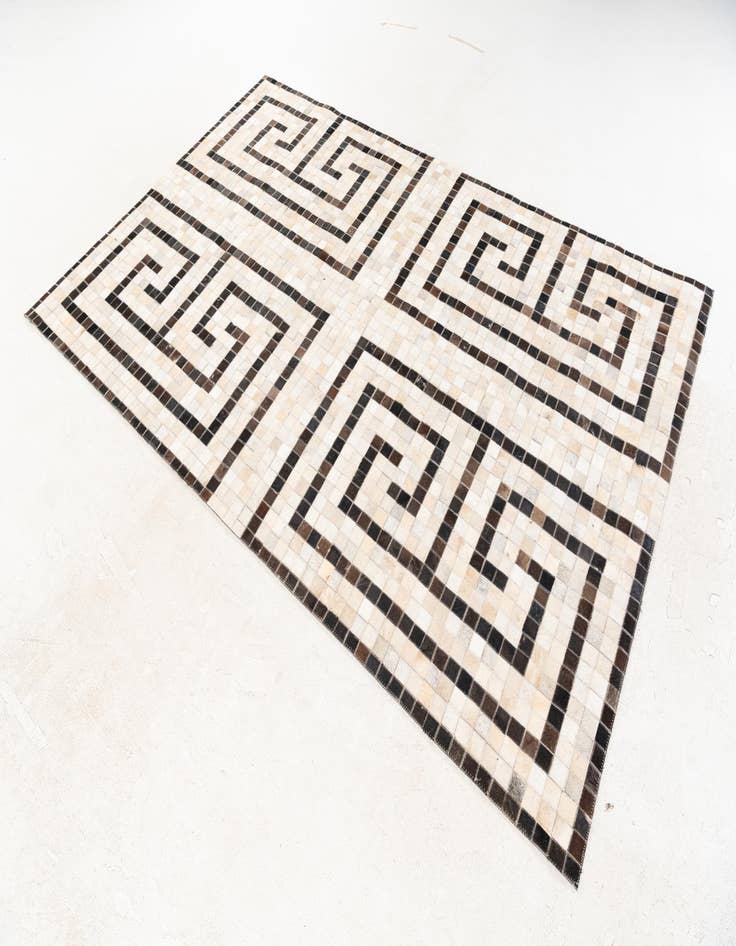 Detail image of  5' 1 x 8' Cowhide Stocks Rug