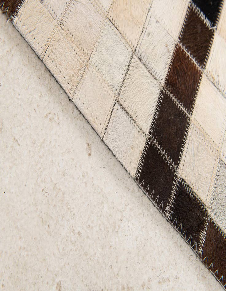 Detail image of  5' 1 x 8' Cowhide Stocks Rug