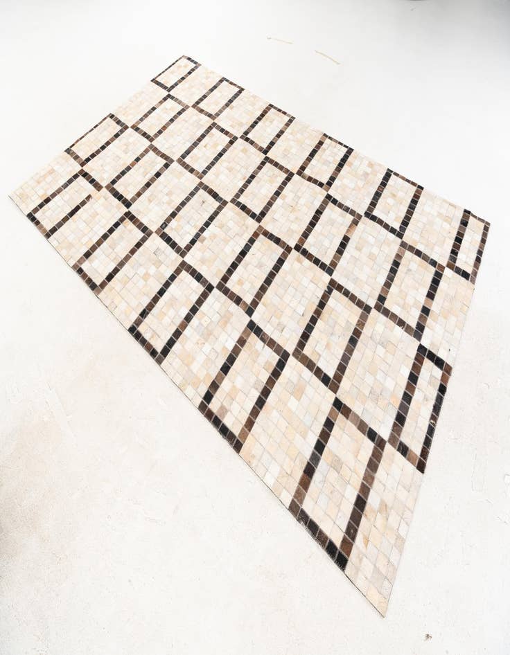 Detail image of  5' 1 x 8' Cowhide Stocks Rug