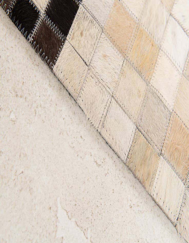 Detail image of  5' 1 x 8' Cowhide Stocks Rug