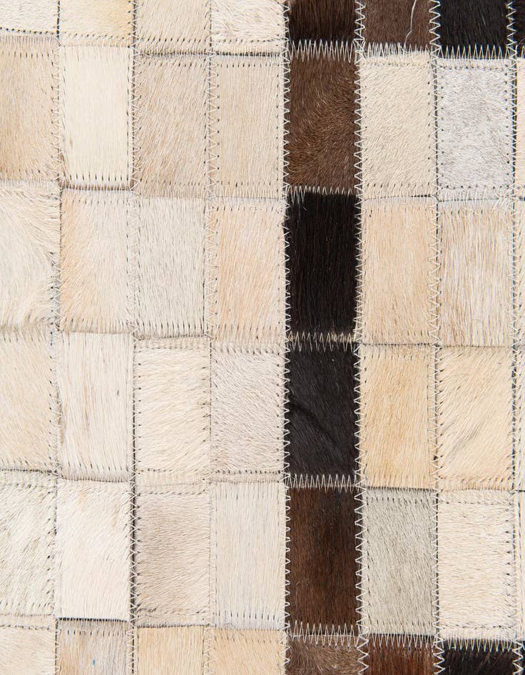 Detail image of  5' 1 x 8' Cowhide Stocks Rug