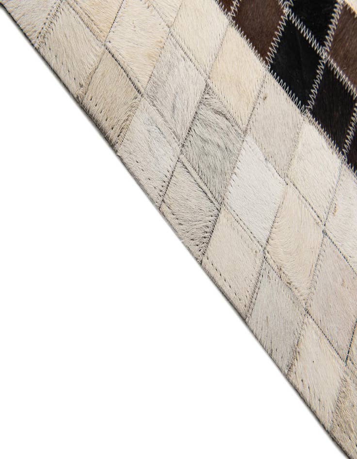 Detail image of  5' 1 x 8' Cowhide Stocks Rug