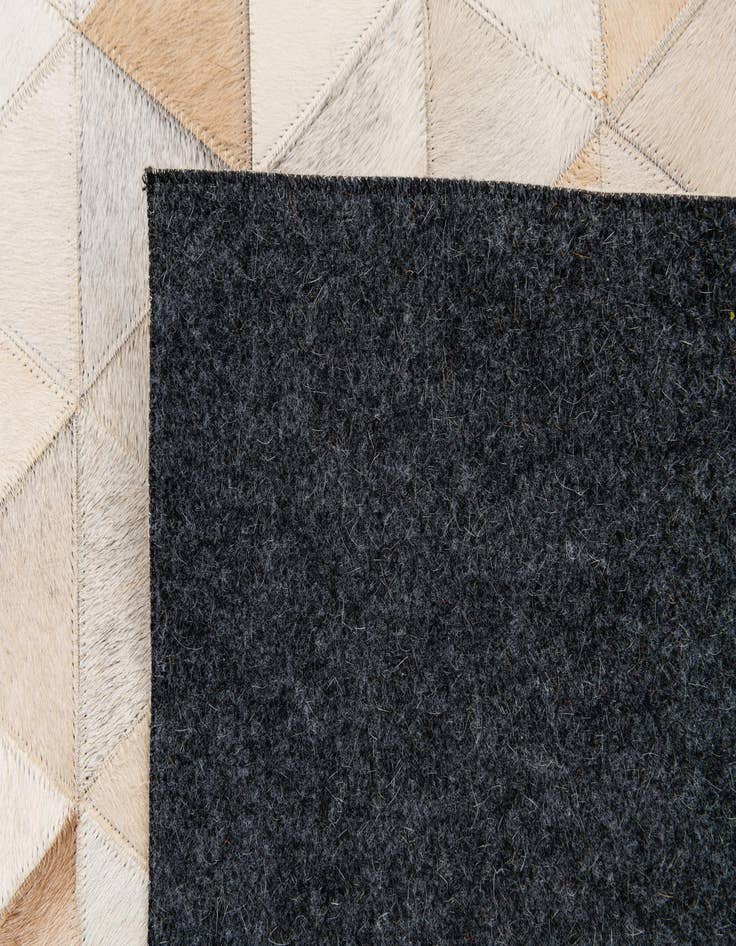 Detail image of  5' 1 x 8' Cowhide Stocks Rug